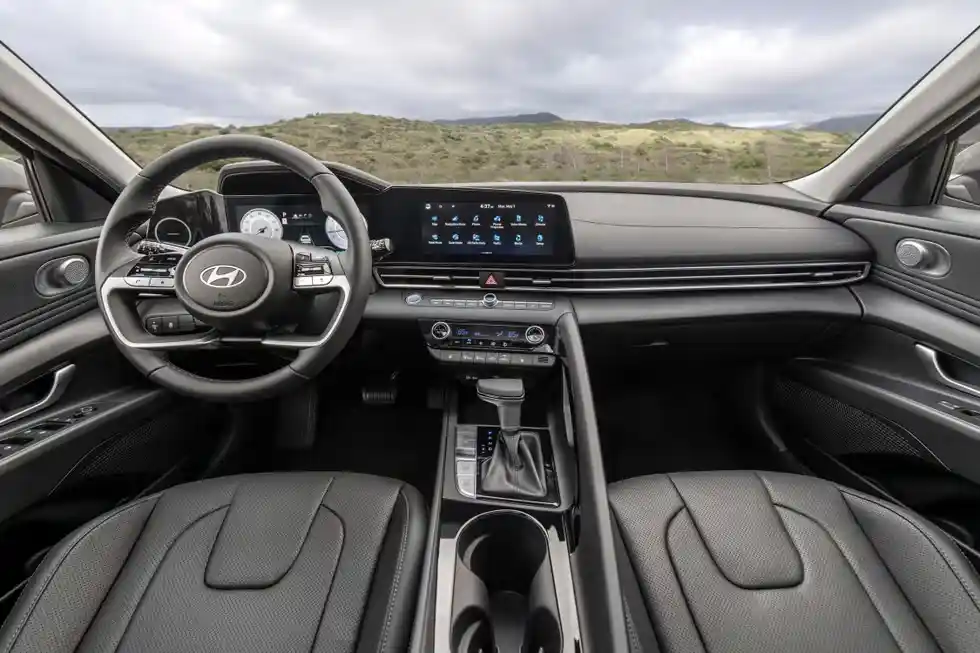 2026 Elantra interior space and infotainment layout 2026 Hyundai Elantra rear seat view and dashboard screens