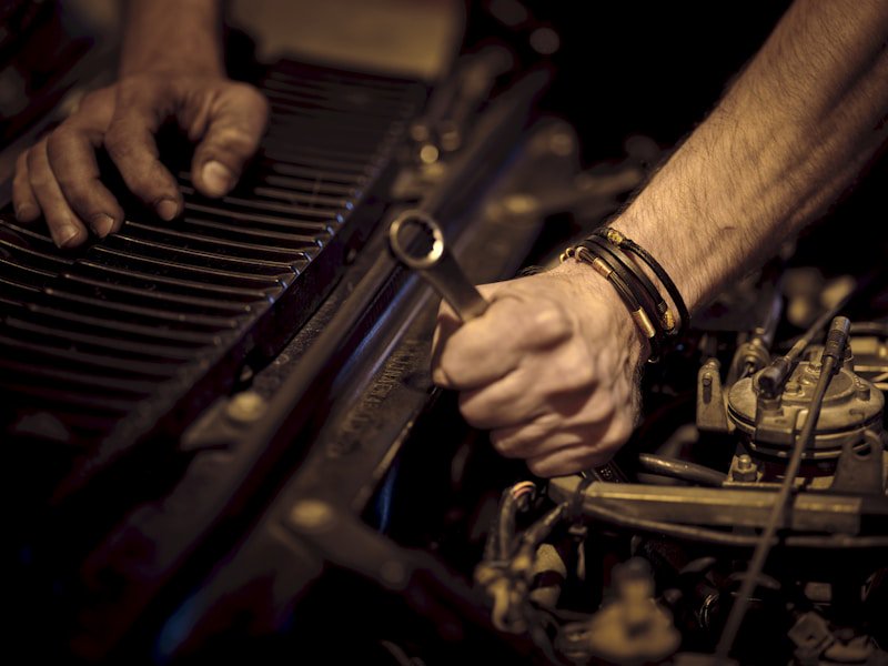 Professional pre-purchase inspection Mechanic inspecting a car